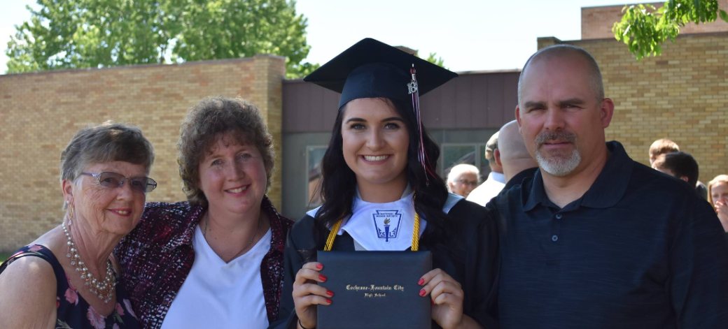 Kalene's daughter at graduation with her family