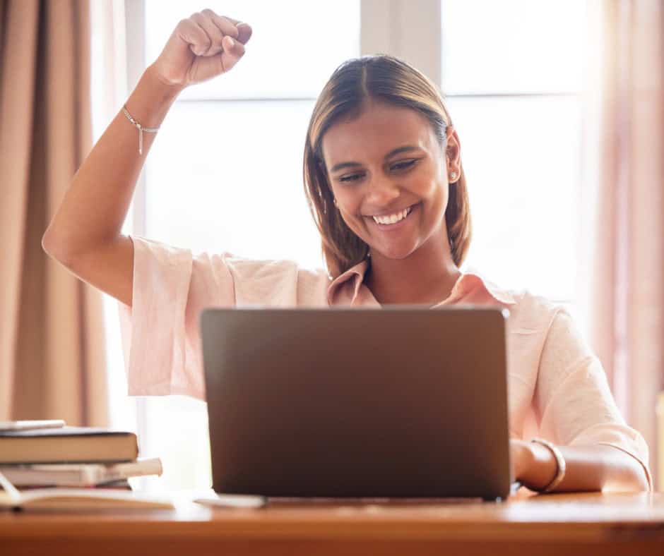 female student winning scholarship money