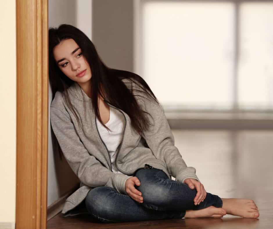 female college student feeling homesick