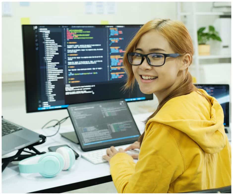 female student taking computer programming