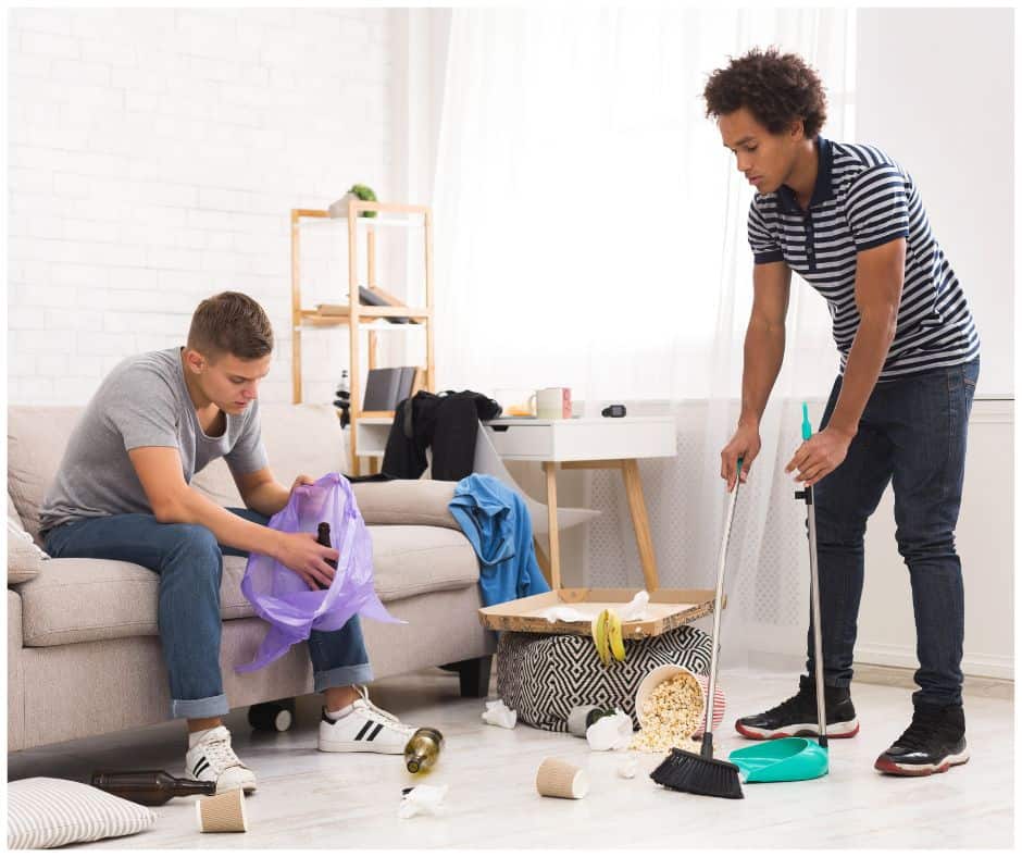 male college roommates cleaning up