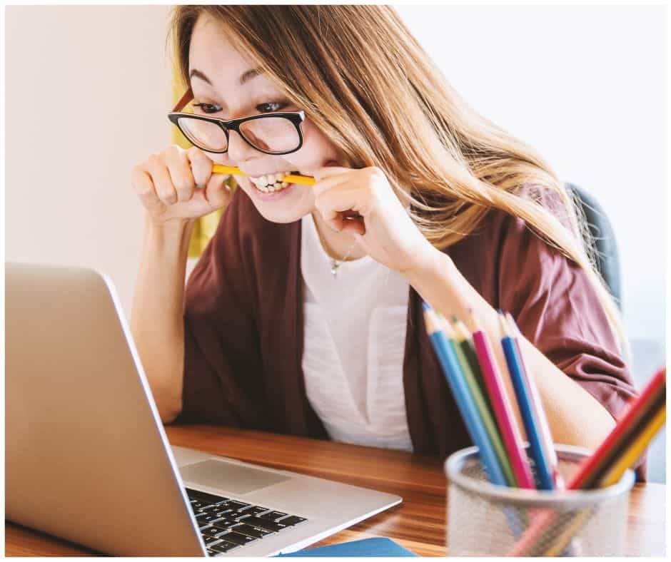 nervous student chewing pencil