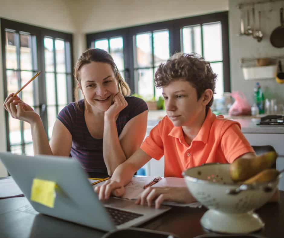 mother teaching son at home