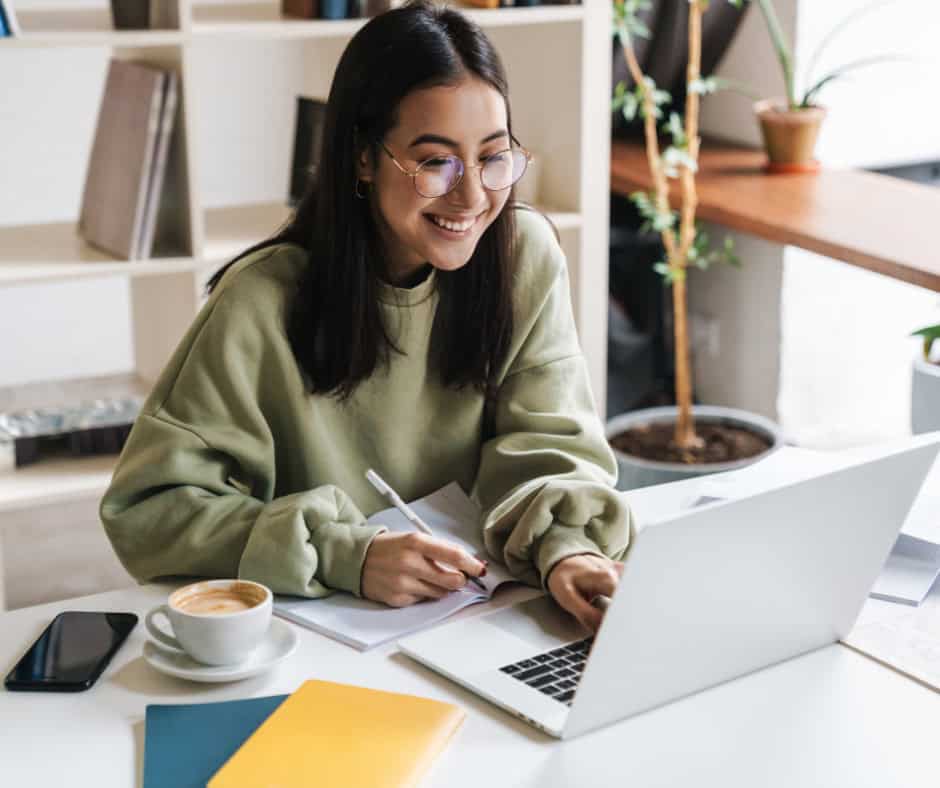 High school student researching dual credit and dual enrollment program options online
