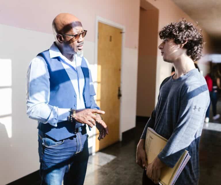 professor talking to his student