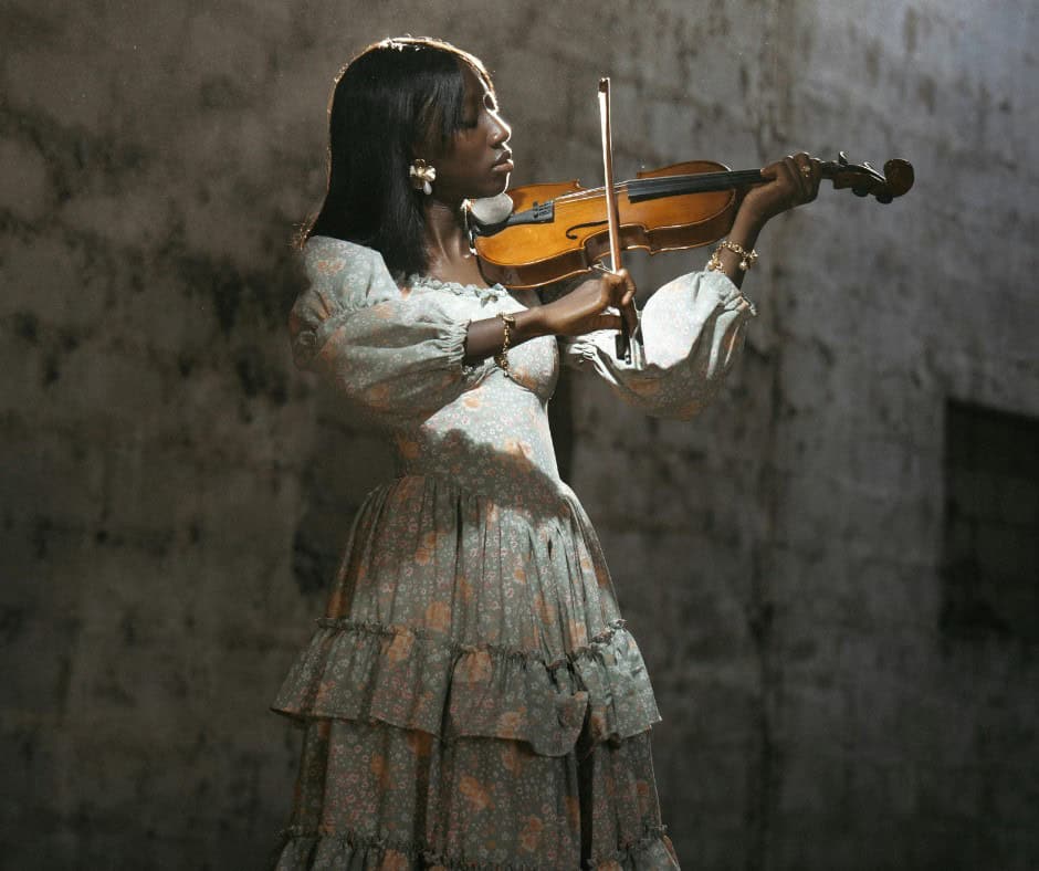 female student playing a violin